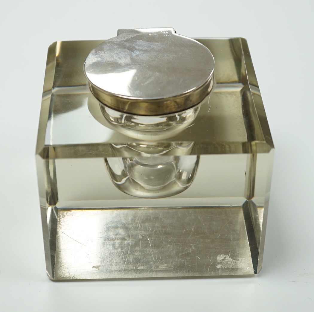 A George V silver mounted glass square inkwell, John Grinsell & Sons, Birmingham, 1925, width 10.1cm.